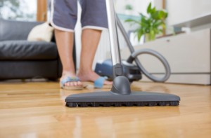 Woman Vacuuming Markham Real Estate Blog